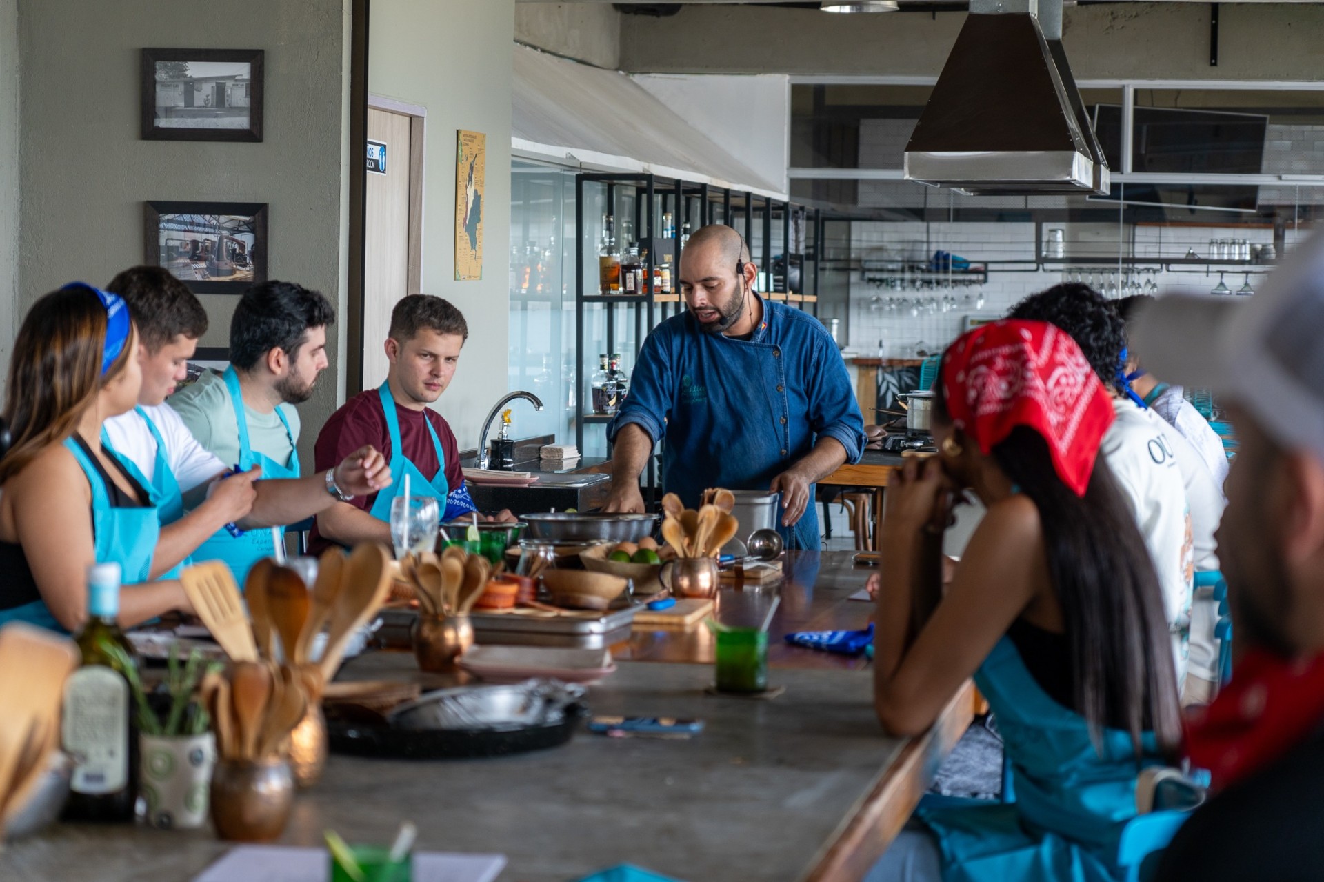 Company team following the chef during a private cooking experience at Lunático