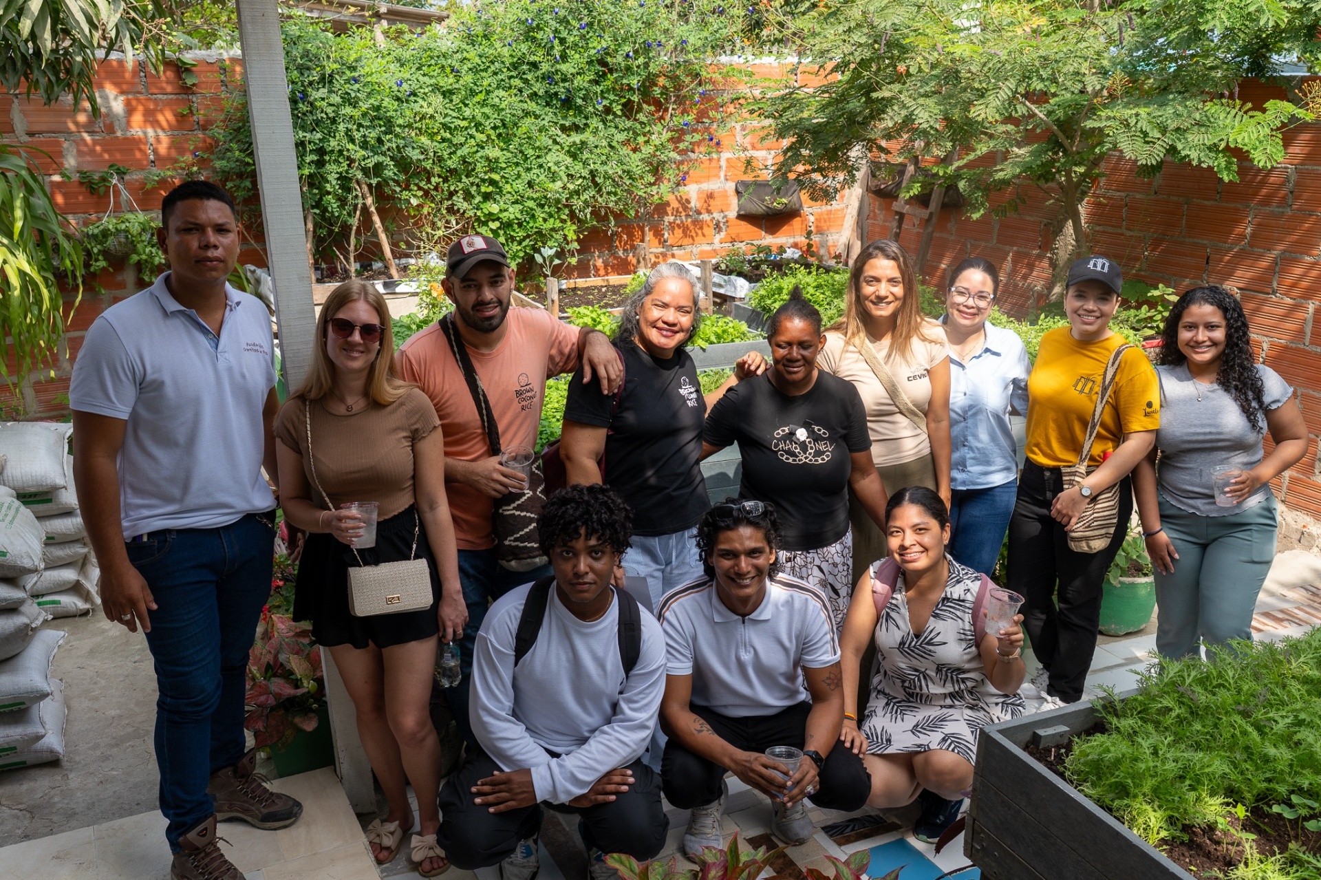 Taste & Transform group visiting a community garden in Cartagena